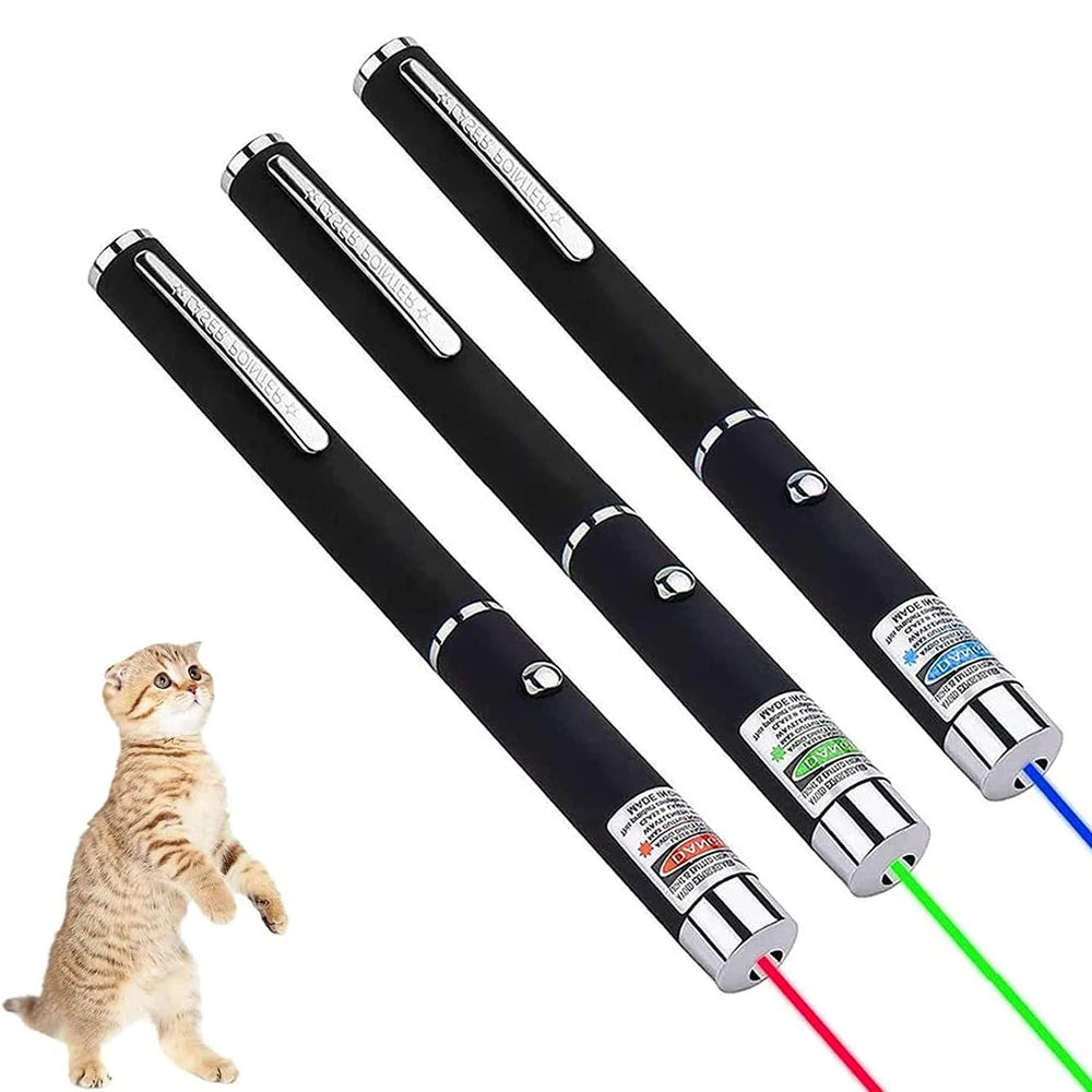 Three laser pointers with red, green, blue beams for cat play, shown with curious tabby kitten