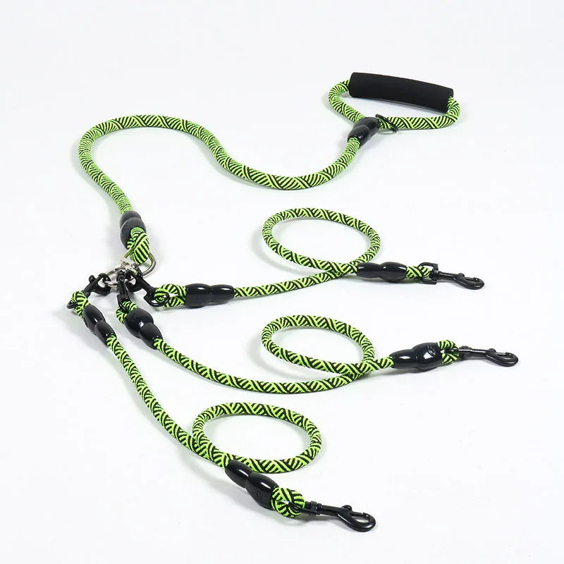 Neon green and black patterned dog leash with padded handle and multiple clips for walking pets