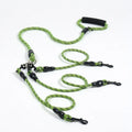 Neon green and black patterned dog leash with padded handle and multiple clips for walking pets
