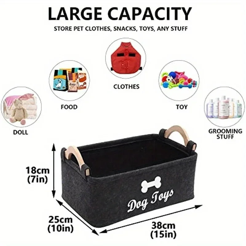 Black felt dog toy storage bin with wooden handles, labeled 'Dog Toys', holds pet essentials like clothes, snacks, and grooming items